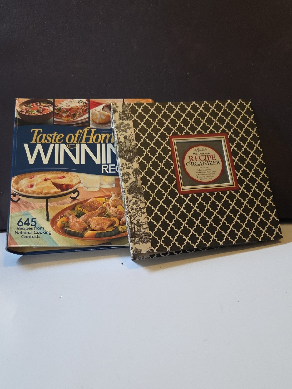 Taste of Home Blue Cookbook with Black & Cream Patterned Recipe Organizer